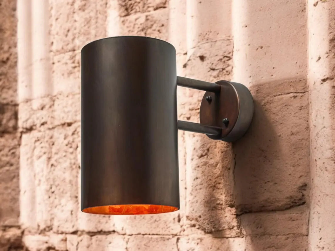 Oxidized black-patina copper wall sconce for outdoor use - modern cylindrical wall sconce with dark bronze exterior finish - copper sconce